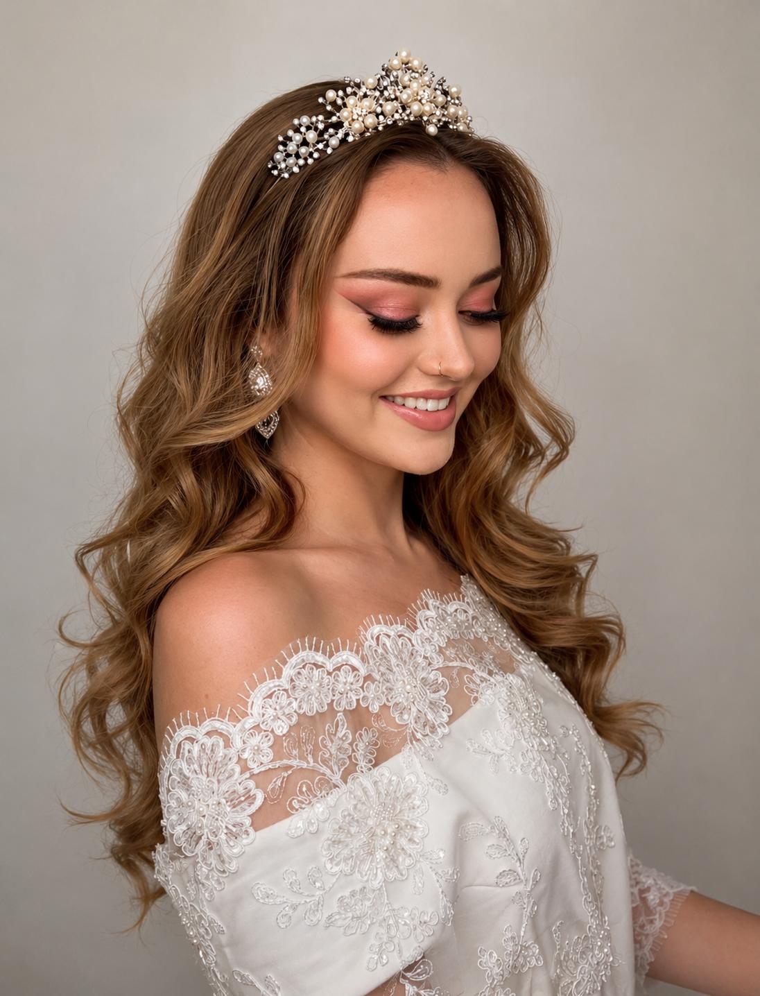 Bride with pearl tiara and off-the-shoulder lace dress — Victoria Beauty bridal beauty.