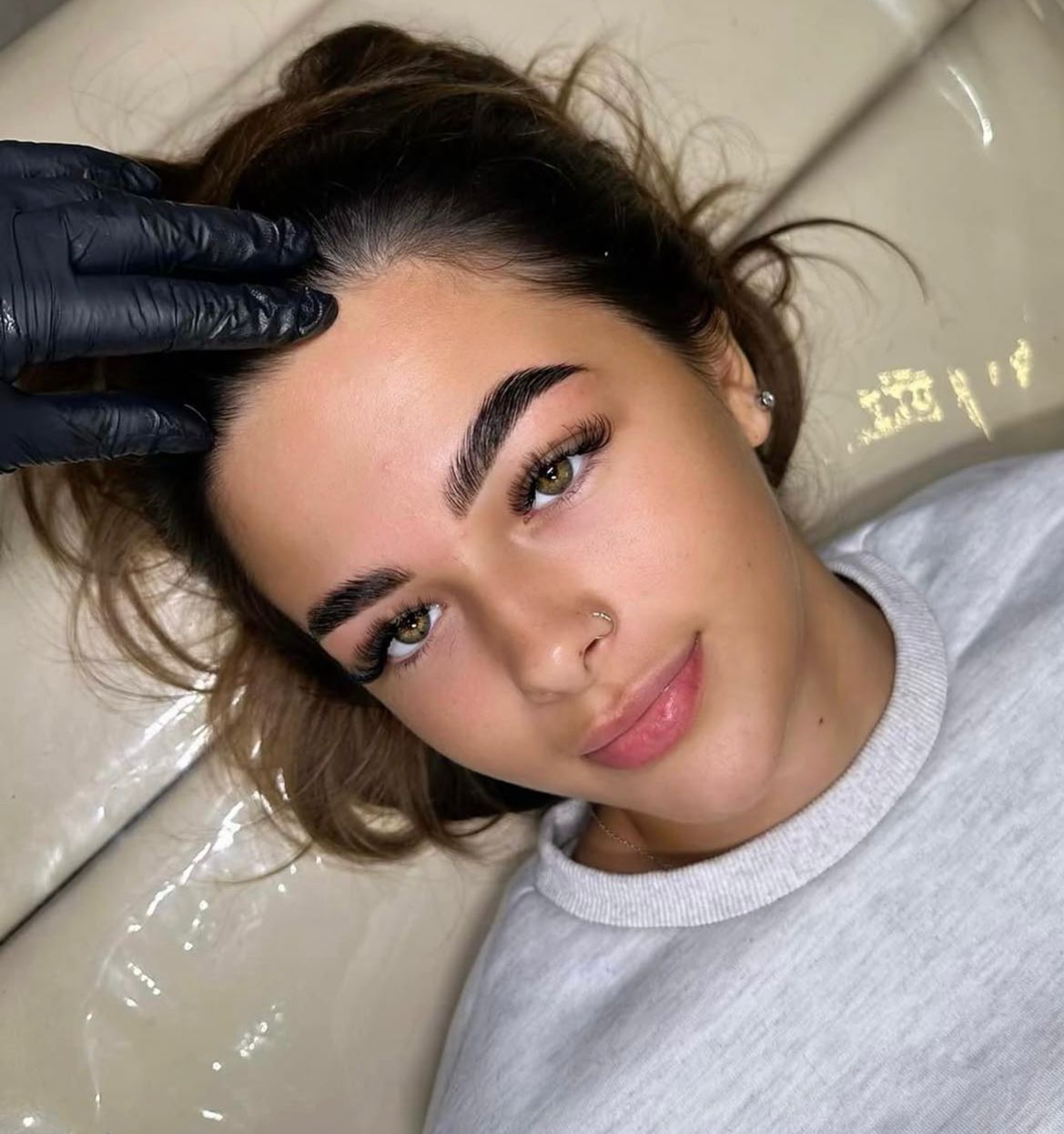 Brow finish with sculpted, refined artistry — Victoria Beauty atelier.