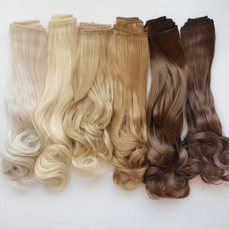 Luxury hair extension set in champagne and brunette tones.
