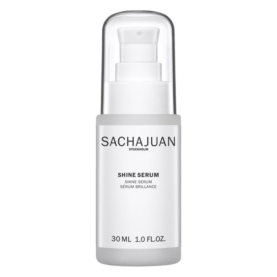 Silk hair serum in glass bottle with gold cap.